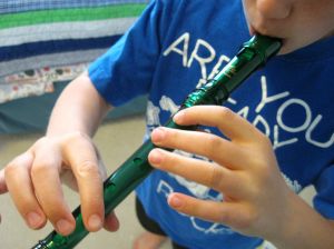 My son playing a recorder