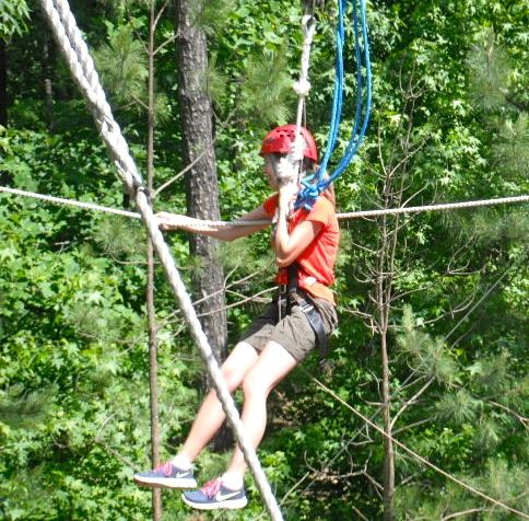 This little zipline wasn't so bad but getting to the pole at the other end and connecting my hooks to a safety wire caused great panic. Thankfully someone did that job for me. I hugged the pole.